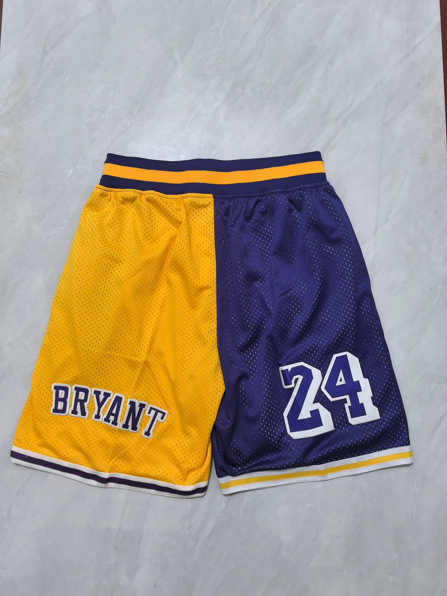LOS ANGELES LAKERS KOBE BRYANT PURPLE AND YELLOW SHORTS