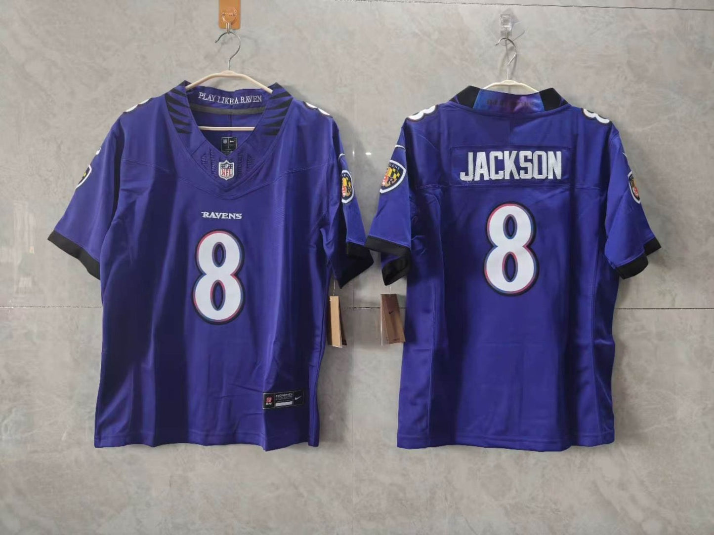 Baltimore Ravens Lamar Jackson, purple jersey ￼