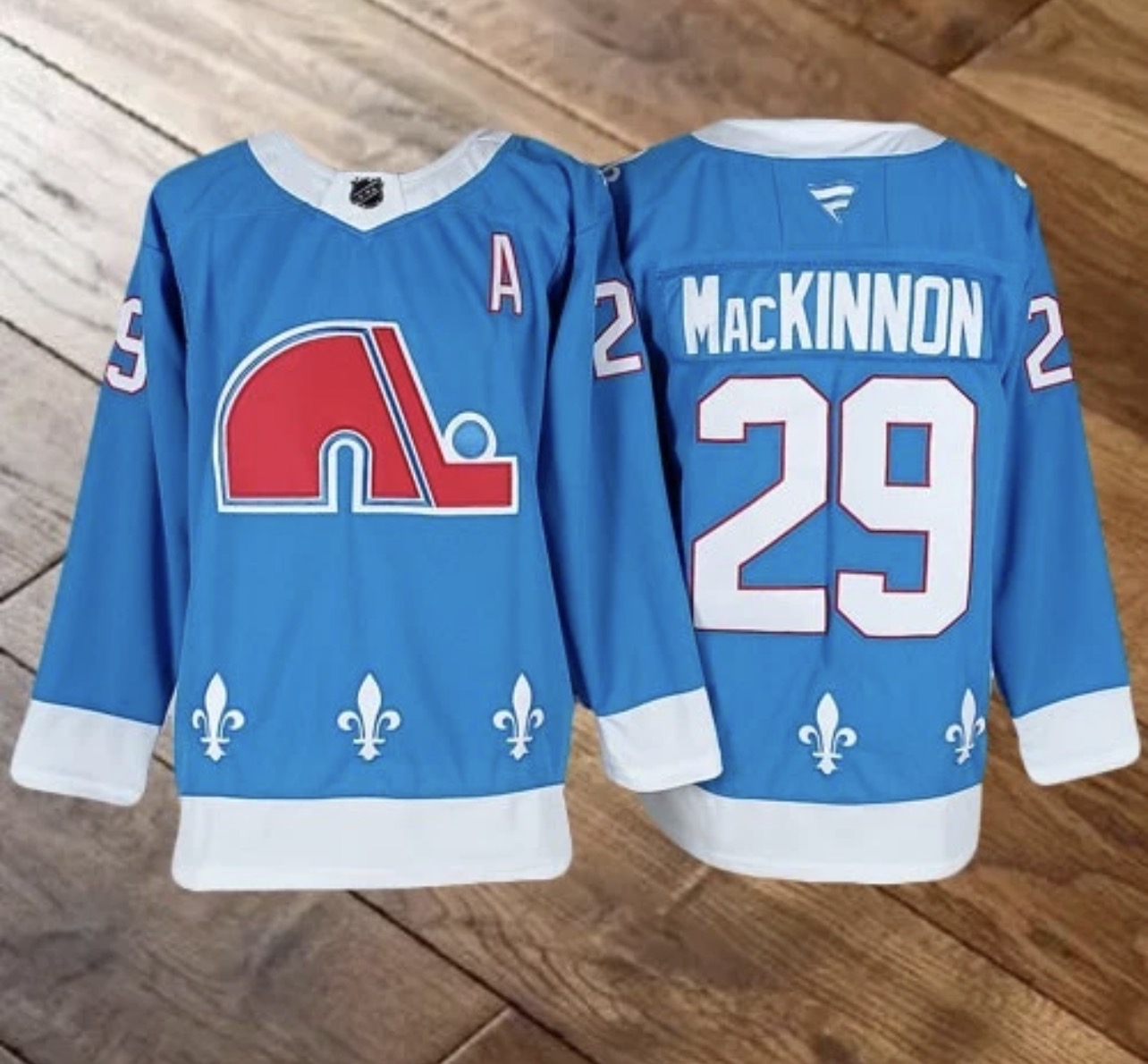 COLORADO AVALANCHE NATHAN MACKINNON BLUE JERSEY