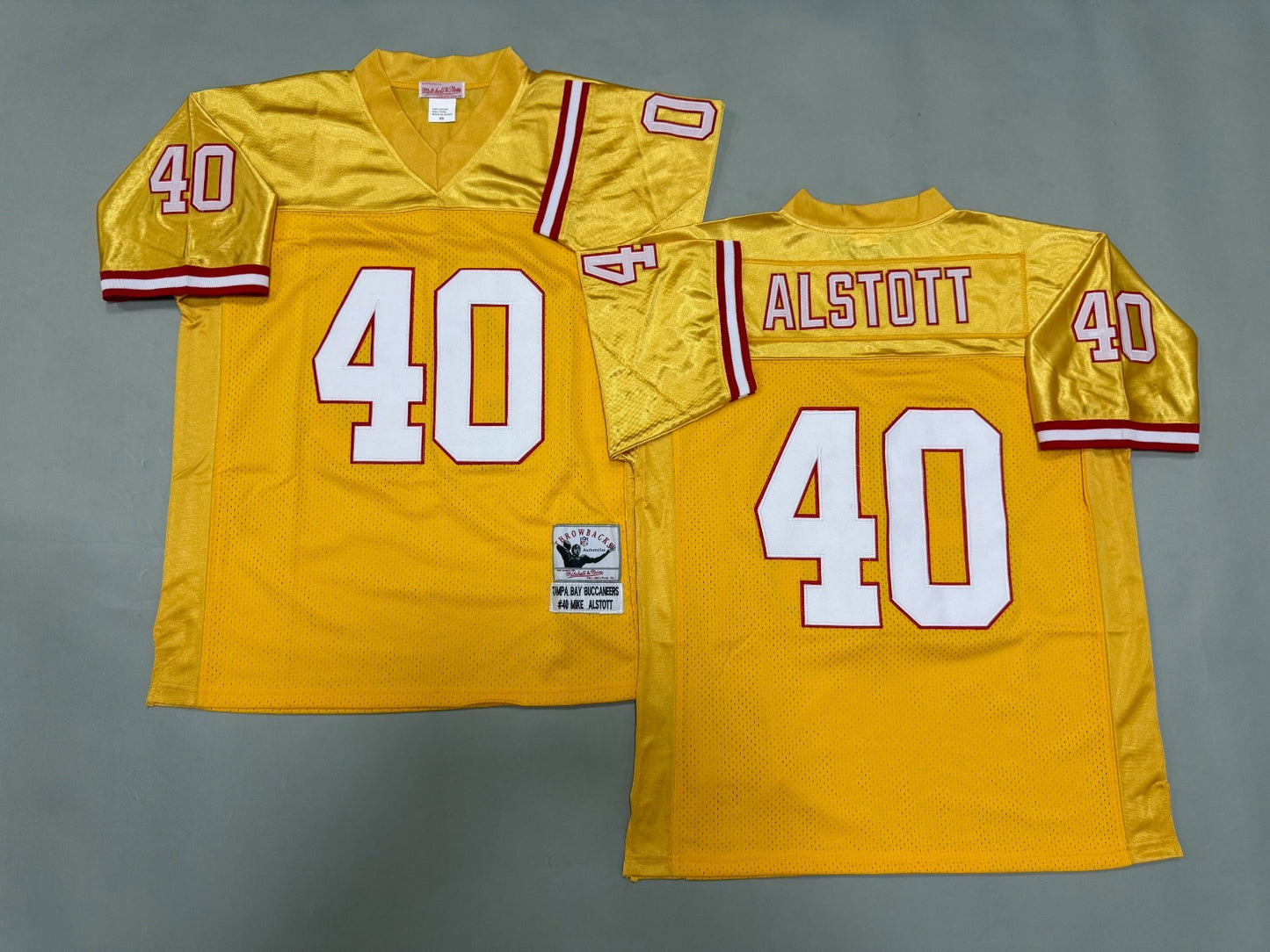 TAMPA BAY BUCCANEERS MIKE ASTOTT YELLOW VINTAGE JERSEY