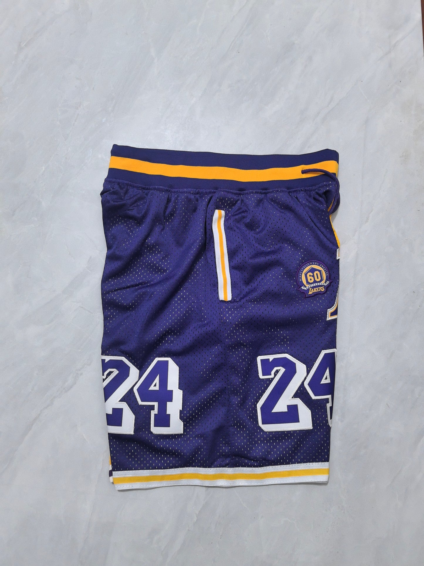 LOS ANGELES LAKERS KOBE BRYANT PURPLE AND YELLOW SHORTS