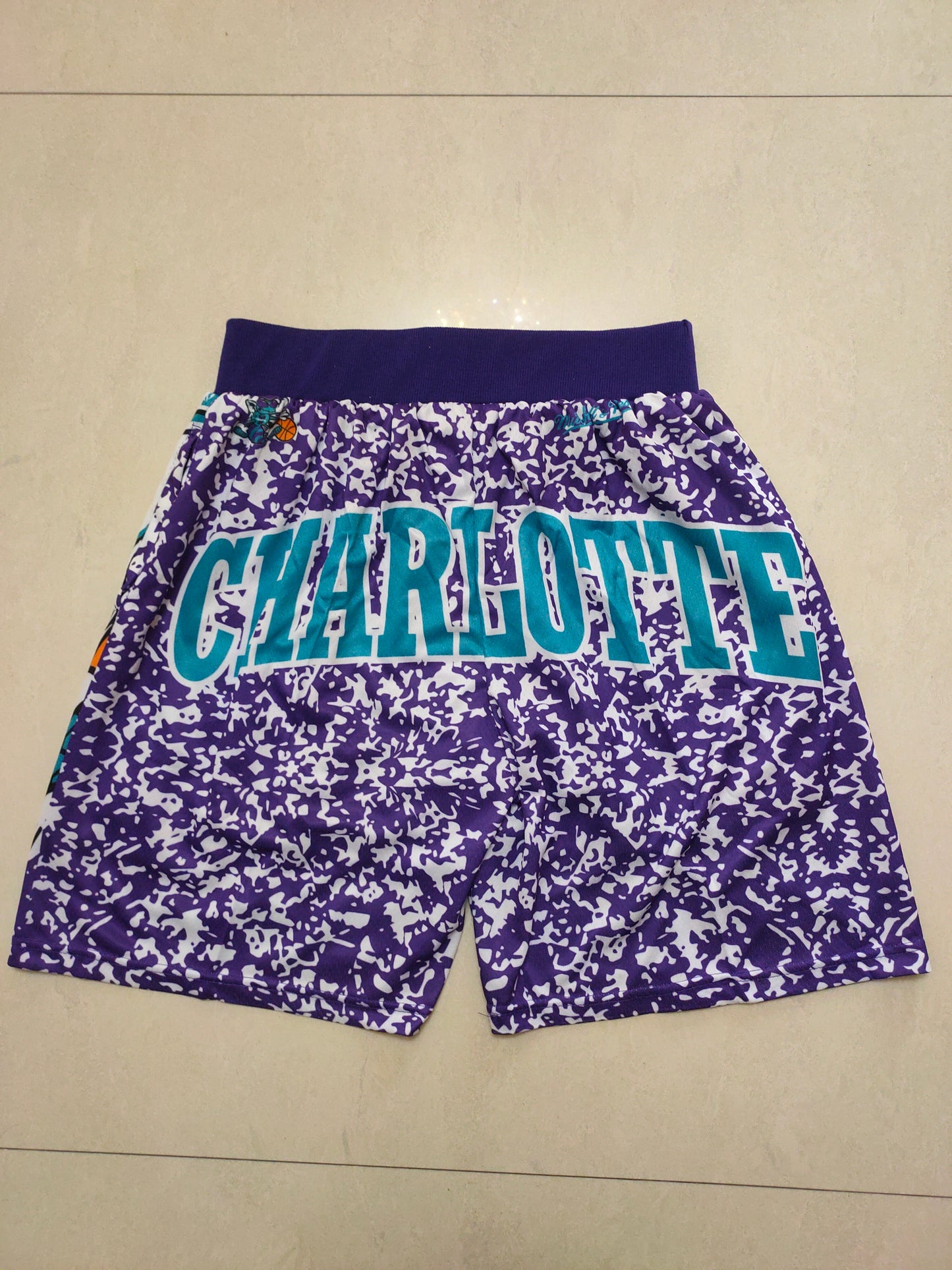 CHARLOTTE HORNETS PURPLE SHORTS